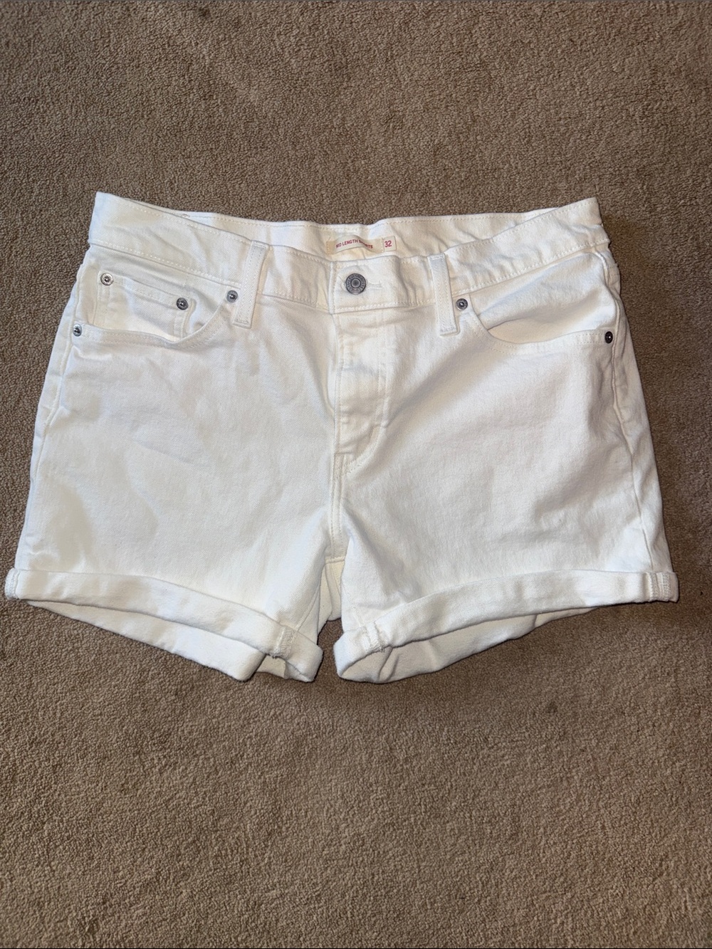 Levi’s women’s mid length shorts size 32 white denim